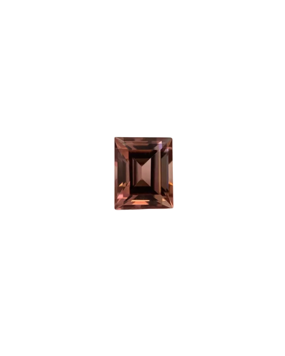 Rectangular brown gemstone on a textured white and black background