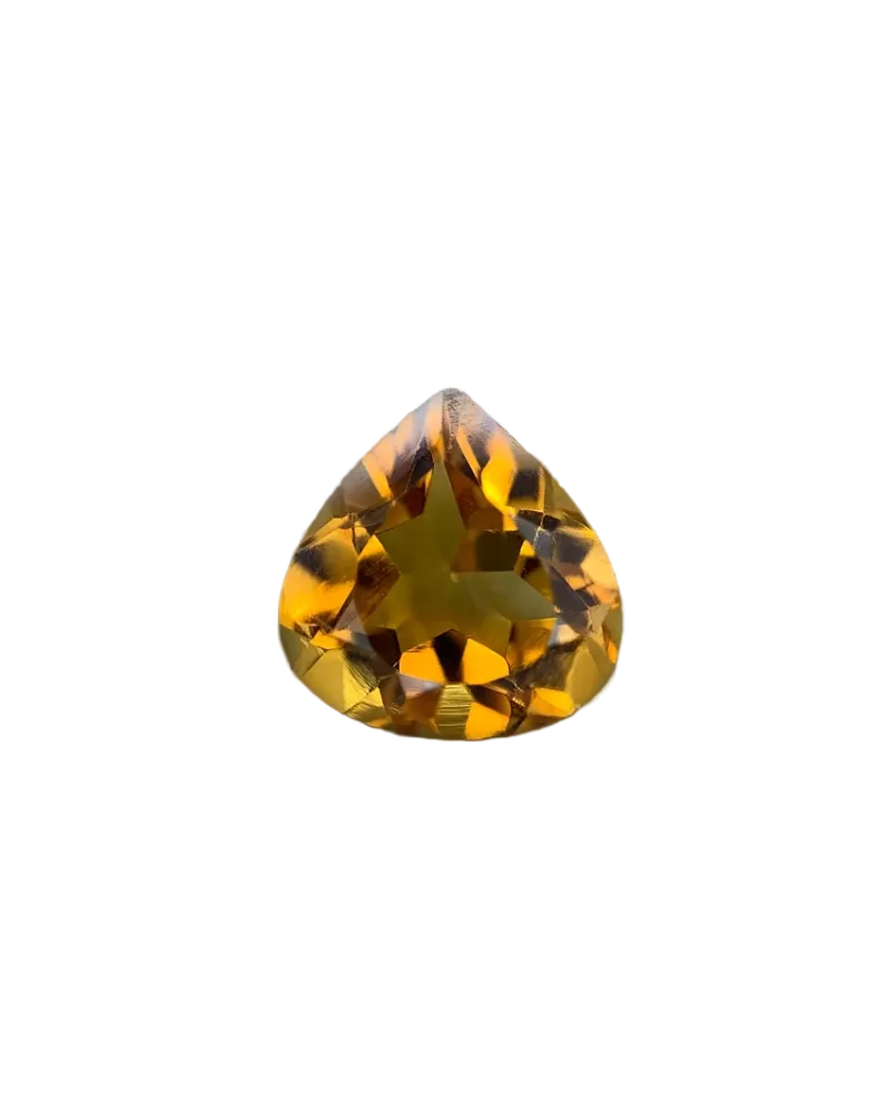 Teardrop-shaped yellow gemstone on a dark gray background
