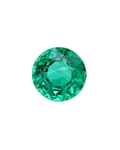 Faceted green gemstone on a white background
