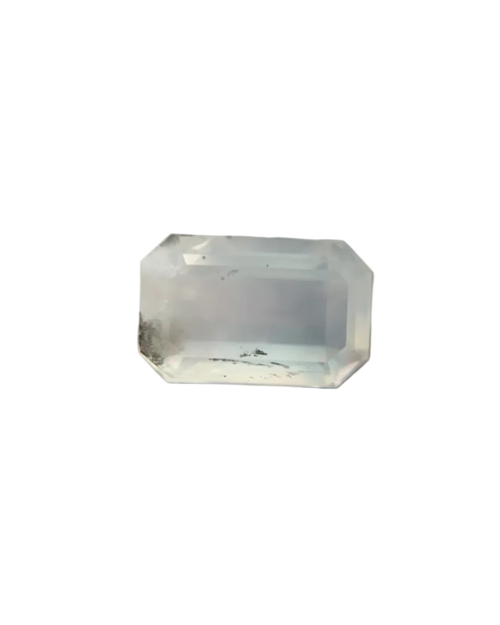 Clear octagonal crystal on a textured surface