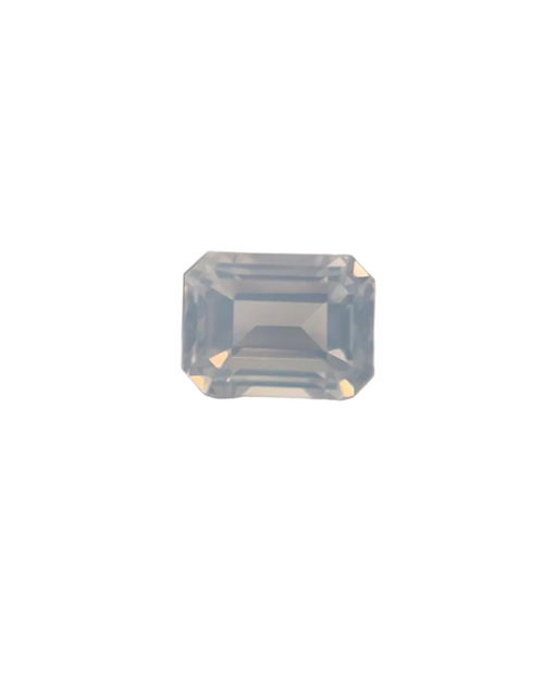 Emerald cut lavender quartz gemstone on a stand with measurement scale