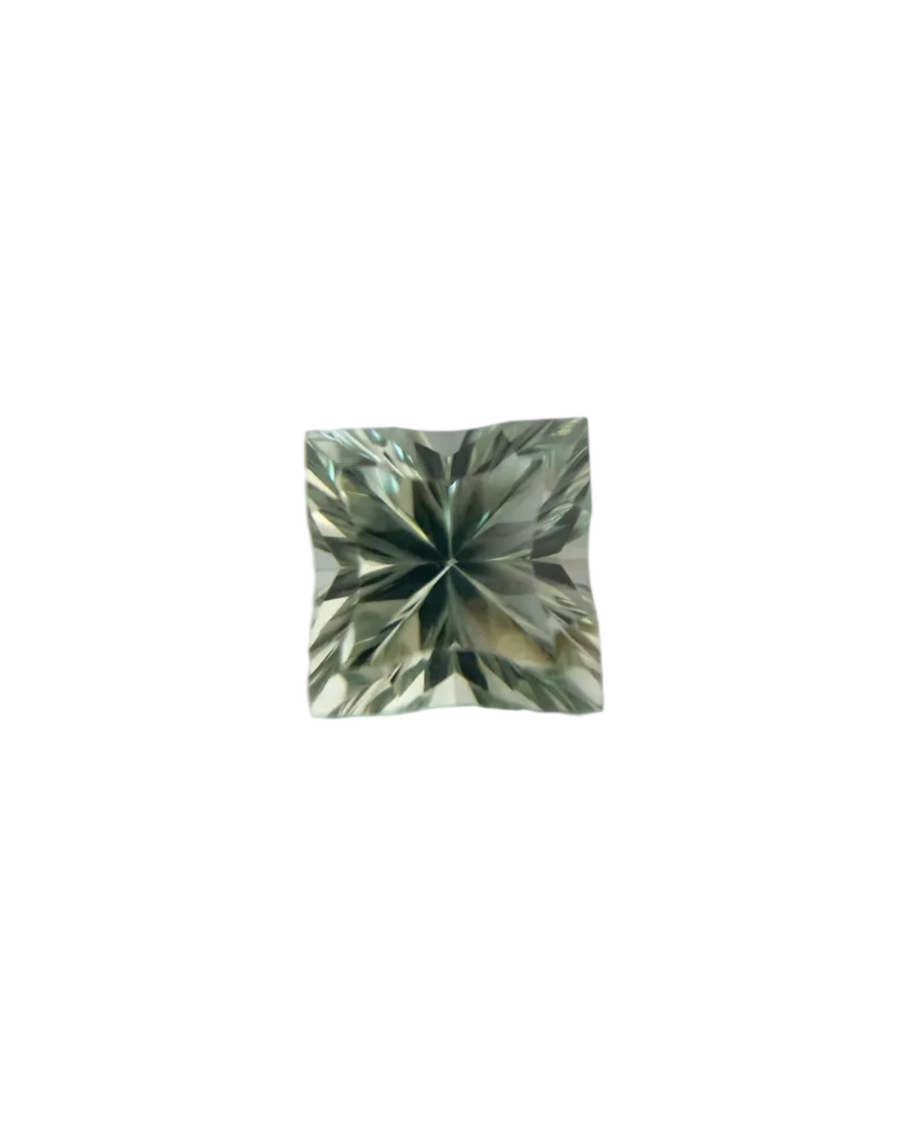 Square-shaped green gemstone on a light gray background