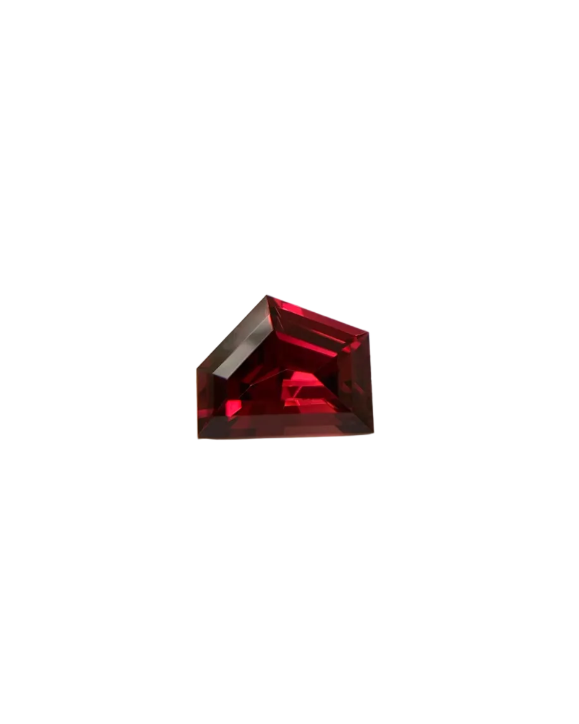 Red gemstone on a textured surface with a blurred background