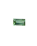 Green gemstone on a textured gray background