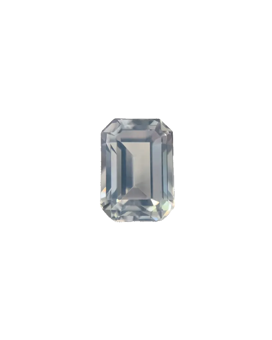 Rectangular cut gemstone on a textured surface