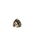 Trillion-shaped diamond on a gray background