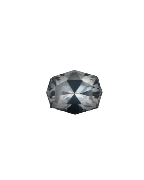 Geometric-patterned object on a dark background